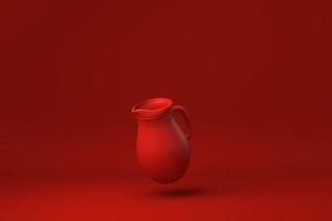 rode kruik of melkkan drijvend op rode achtergrond. minimaal concept idee creatief. monochroom. 3D render. foto