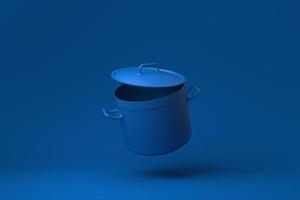 blauwe roestvrijstalen pot drijvend op een blauwe achtergrond. minimaal concept idee creatief. monochroom. 3D render. foto