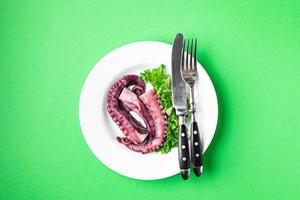 octopus eten in bord tweede gangen zeevruchten verse maaltijd foto