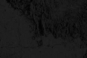 abstracte zwarte gebarsten verroeste halftone vintage overlay grijze grunge noodlijdende textuur op zwart. foto