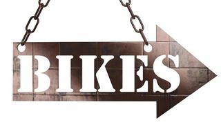 fietsen woord op metalen aanwijzer foto