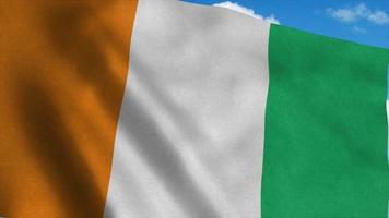 Ivoorkust vlag zwaaien in de wind, blauwe hemelachtergrond. 3D-rendering foto