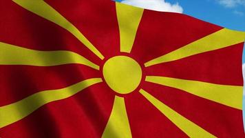 Macedonië vlag zwaaien in de wind, blauwe hemelachtergrond. 3D-rendering foto