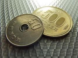 japans geld, zilveren munt, yen foto