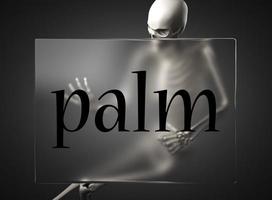 palmwoord op glas en skelet foto