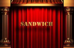 sandwich gouden woord op rood gordijn foto