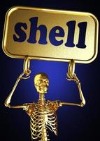 shell woord en gouden skelet foto