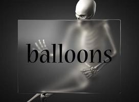 ballonnen woord op glas en skelet foto