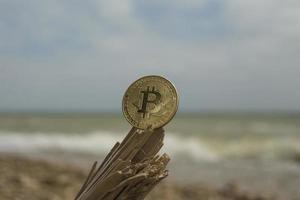 bitcoin cryptocurrency op zee foto