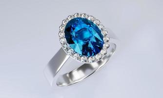 de grote ovale blauwe diamant is omgeven door vele diamanten op de ring gemaakt van platina goud geplaatst op een witte achtergrond. 3D-rendering foto