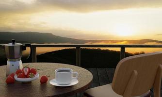 houten tafel en stoel set met zwarte koffie en moka pot met verse aardbeien in witte keramische kopjes op het terras of balkon. berglandschap in de ochtend met zonlicht. 3D-rendering foto