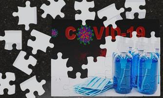 legpuzzelfoto overlapt, de achtergrond is een coronaal covid-19-virus en de afbeelding hierboven is een puzzelmasker en een alcoholgel. conceptueel beeld van het voorkomen van ziektekiemen met virusmaskers. 3D-rendering foto