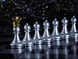 zilveren schaakpion draagt gouden kroon tot leiderschap op schaakbord met netwerk en communicatie om te vechten met teamwerk tot overwinning, bedrijfsstrategieconcept voor succes. foto
