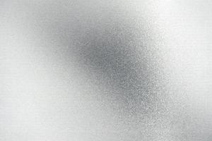 glanzend geborsteld zilver metalen plaat, abstracte textuur achtergrond foto