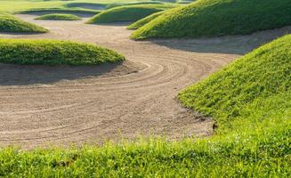 golfbaan zandbunker achtergrond voor het zomertoernooi foto