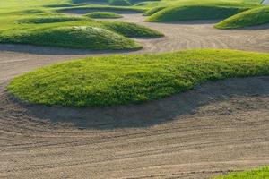 golfbaan zandbunker achtergrond voor het zomertoernooi foto