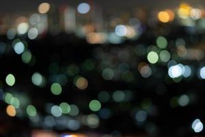 abstract licht in de stad bokeh en intreepupil lichten, nacht wazig achtergrond foto