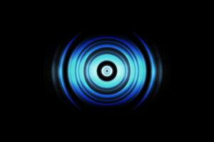 geluidsgolven oscillerend blauw licht met cirkel spin abstracte achtergrond foto