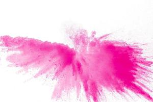 roze stofdeeltjes splash.pink poeder explosie op witte achtergrond. foto