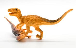 dinosaurus vechtscène op witte achtergrond foto