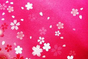 roze achtergrond met bloemblaadjes foto