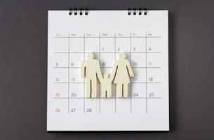 wit pictogram familie op kalender, familie concept foto