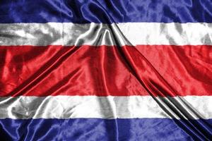 costa rica doek vlag satijnen vlag wuivende stof textuur van de vlag foto