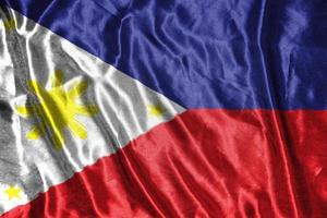 filippijnen doek vlag satijnen vlag wuivende stof textuur van de vlag foto
