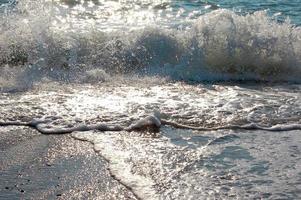 golven op zee foto