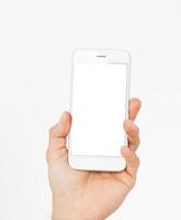 mannelijke hand houdt leeg scherm telefoon geïsoleerd op een witte achtergrond, uitknippad binnen, nieuwe mobiele apps. bovenaanzicht, mock-up, kopiëren foto
