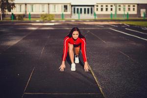 jonge atleet vrouw foto