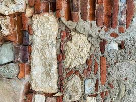 oude bakstenen muur achtergrond. bakstenen muur textuur foto