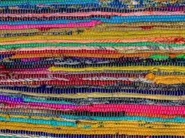 gekleurde textiel tapijt achtergrond. tapijt textuur foto