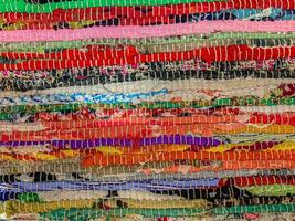 gekleurde textiel tapijt achtergrond. tapijt textuur foto