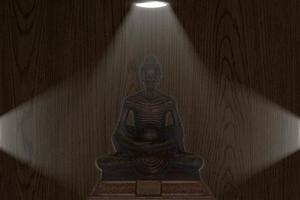 model van Boeddha pang ascese op het hout en de downlight foto