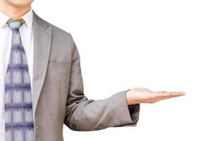 zakenman toont iets op palm geïsoleerd op een witte achtergrond foto