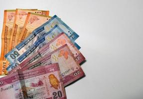 Srilankaanse bankbiljetten en munten foto