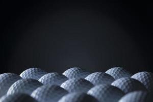 groep golfballen die op zwarte achtergrond wordt geïsoleerd.