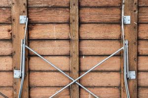 close-up zicht op verschillende houten oppervlakken van planken, logboeken en houten muren in hoge resolutie foto