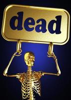 dood woord en gouden skelet foto