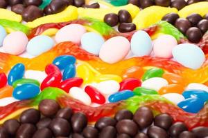macro kleurrijke snoep, lolly en snoep achtergrond. bovenaanzicht. selectieve aandacht. foto