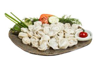 kom met traditioneel Russisch gerecht - pelmeni foto