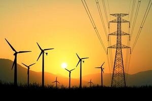 silhouetten van windturbines worden gebruikt om in de avonduren elektriciteit op te wekken in de velden. foto