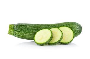 Courgette geïsoleerd op witte achtergrond foto