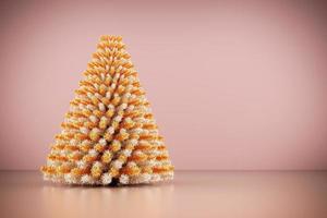 glanzende moderne kerstboom op roze gouden muurachtergrond. foto