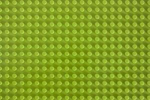 groene plastic bouwstenen mat met lege copyspace foto