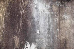 oude betonnen vloer in zwart-witte kleur, cement, gebroken, vies, achtergrondstructuur foto