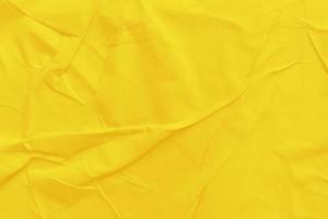 blanco geel papier is een verfrommelde textuurachtergrond. verfrommeld papier textuur achtergronden voor verschillende doeleinden foto