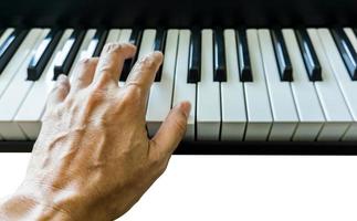 linkerhand piano spelen geïsoleerde afbeelding geen mensen witte achtergrond foto