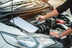 controleer de staat van de auto foto